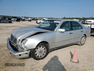 1999 Mercedes-Benz E-Class with VIN WDBJF65H9XA903481, listed as a Copart auction lot 79516914 with 201,080 mi miles and Salvage Title. Bid and sale history available at carsss.com. Image 1.