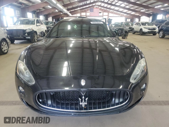 2009 Maserati GranTurismo с VIN ZAMHL45A690047979, выставлен на аукционе Copart как лот 59949845 с пробегом 65 912 миль миль и Чистый • Clean title. История ставок и продаж доступна на DreamBid. Изображение 5.