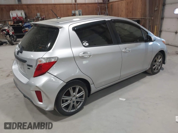 2012 Toyota Yaris L with VIN JTDKTUD31CD511550, listed as a IAAI auction lot 42157934 with 131,183 mi miles. Bid and sale history available at carsss.com. Image 4.