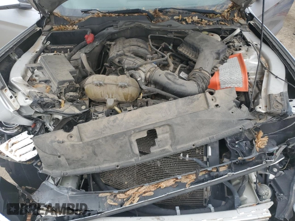 2015 Ford Mustang V6 z VIN 1FATP8EM5F5415089, wystawiony jako Copart lot #55514595 z przebiegiem 118 572 mil mil oraz Szkoda całkowita • Salvage title. Historia ofert i sprzedaży dostępna na DreamBid. Obrazek 11.