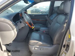 2010 Toyota Sienna XLE with VIN 5TDDK4CC8AS032007, listed as a Copart auction lot 65611495 with 299,904 mi miles and Salvage title. Bid and sale history available at DreamBid. Image 7.