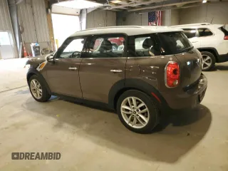 2012 MINI Countryman with VIN WMWZB3C52CWM01672, listed as a Copart auction lot 56064265 with 97,267 mi miles and Salvage Title. Bid and sale history available at DreamBid. Image 2.