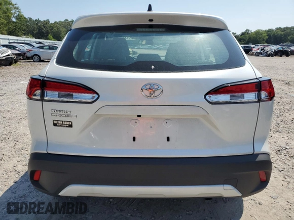 2023 Toyota Corolla Cross L with VIN 7MUAAAAG7PV044822, listed as a Copart auction lot 57744765 with 12,839 mi miles and Salvage title. Bid and sale history available at DreamBid. Image 6.