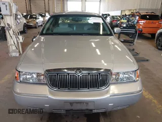 2000 Mercury Grand Marquis LS z VIN 2MEFM75W0YX736324, wystawiony jako IAAI lot #41865927 z przebiegiem 136 886 mil mil oraz . Historia ofert i sprzedaży dostępna na DreamBid. Obrazek 12.