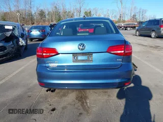 2015 Volkswagen Jetta SE z VIN 3VWD07AJ4FM285676, wystawiony jako IAAI lot #41787061 z przebiegiem 142 537 mil mil oraz . Historia ofert i sprzedaży dostępna na DreamBid. Obrazek 15.