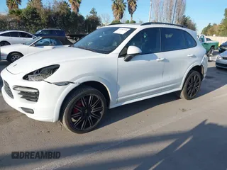 2013 Porsche Cayenne GTS with VIN WP1AD2A22DLA71143, listed as a IAAI auction lot 41287138 with 143,434 mi miles and . Bid and sale history available at DreamBid. Image 21.