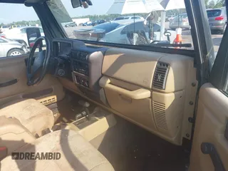 2002 Jeep Wrangler X with VIN 1J4FA39S72P733034, listed as a IAAI auction lot 42659447 with 200,786 mi miles and . Bid and sale history available at DreamBid. Image 5.