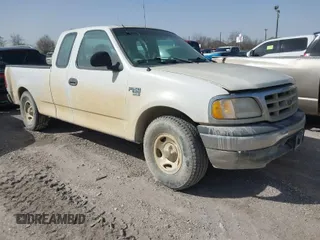 2000 Ford F-150 XL with VIN 1FTRX17W6YNC32992, listed as a IAAI auction lot 41633118 with 174,989 mi miles. Bid and sale history available at carsss.com. Image 1.