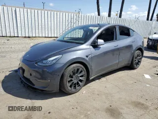 2021 Tesla Model Y Long Range z VIN 5YJYGDEE7MF152990, wystawiony jako Copart lot #51629615 z przebiegiem Nie podano mil oraz Szkoda całkowita • Salvage title. Historia ofert i sprzedaży dostępna na DreamBid. Obrazek 1.