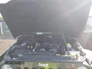 2015 Jeep Wrangler Unlimited Altitude с VIN 1C4HJWEG7FL584395, выставлен на аукционе IAAI как лот 42399987 с пробегом 142 906 миль миль и . История ставок и продаж доступна на DreamBid. Изображение 10.