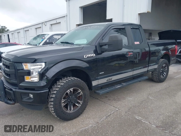 2015 Ford F-150 XLT with VIN 1FTEX1EP2FFC73234, listed as a IAAI auction lot 41661655 with 150,371 mi miles. Bid and sale history available at carsss.com. Image 17.
