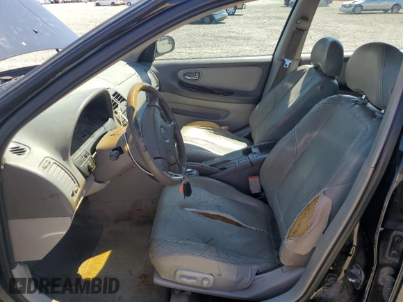 2000 Nissan Maxima GXE z VIN JN1CA31D6YT762114, wystawiony jako Copart lot #57908775 z przebiegiem 207 805 mil mil oraz Szkoda całkowita • Salvage title. Historia ofert i sprzedaży dostępna na DreamBid. Obrazek 7.
