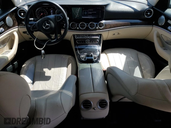 2017 Mercedes-Benz E 300 Luxury with VIN WDDZF4JB3HA074523, listed as a Copart auction lot 52314735 with 130,619 mi miles and Salvage Title. Bid and sale history available at DreamBid. Image 8.