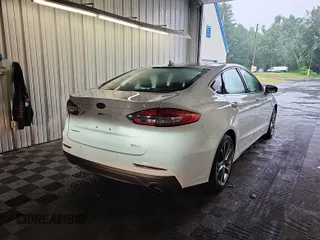 2020 Ford Fusion SEL with VIN 3FA6P0CD1LR154201, listed as a IAAI auction lot 42715761 with 99,448 mi miles and . Bid and sale history available at DreamBid. Image 39.