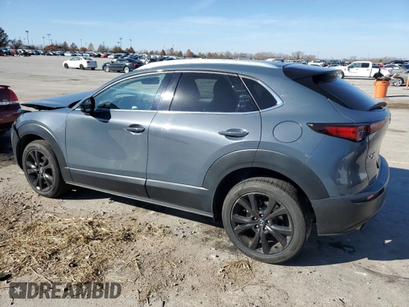 2021 Mazda CX-30 Premium with VIN 3MVDMBDY6MM300242, listed as a Copart auction lot 82195024 with 34,500 mi miles and Salvage Title. Bid and sale history available at carsss.com. Image 2.