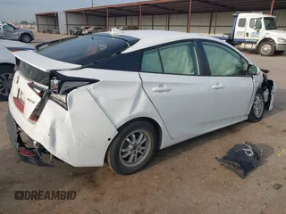 2019 Toyota Prius L Eco z VIN JTDKARFU8K3069783, wystawiony jako IAAI lot #42041554 z przebiegiem 107 363 mil mil oraz . Historia ofert i sprzedaży dostępna na DreamBid. Obrazek 4.
