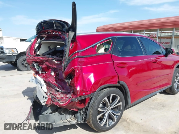 2018 Lexus RX with VIN JTJGZKCA9J2003227, listed as a IAAI auction lot 41793170 with 97,907 mi miles. Bid and sale history available at carsss.com. Image 19.