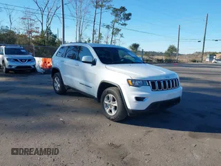 2017 Jeep Grand Cherokee Laredo with VIN 1C4RJFAG7HC688625, listed as a IAAI auction lot 41295860 with 115,714 mi miles. Bid and sale history available at carsss.com. Image 1.