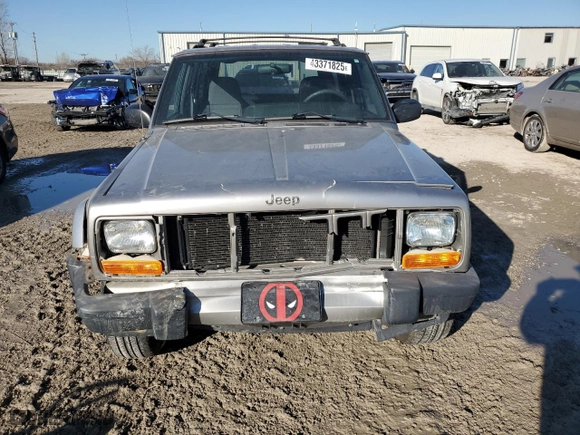 2000 Jeep Cherokee Police with VIN 1J4FF48S7YL117536, listed as a Copart auction lot 43371825 with NaN miles and Salvage Title. Bid and sale history available at carsss.com. Image 5.