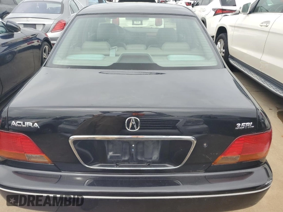 1998 Acura RL Premium with VIN JH4KA9656WC001298, listed as a Copart auction lot 73740154 with 108,066 mi miles and Salvage Title. Bid and sale history available at carsss.com. Image 6.
