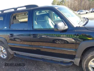 2002 Chevrolet Suburban Z71 with VIN 3GNFK16Z52G264577, listed as a IAAI auction lot 41581984 with 321,321 mi miles. Bid and sale history available at carsss.com. Image 13.