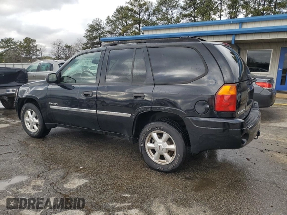 2006 GMC Envoy SLT with VIN 1GKDS13S762258032, listed as a Copart auction lot 88677095 with 184,188 mi miles and Salvage Title. Bid and sale history available at carsss.com. Image 2.