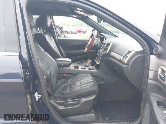 2017 Jeep Grand Cherokee Laredo with VIN 1C4RJFAGXHC912454, listed as a IAAI auction lot 42140735 with 138,895 mi miles and . Bid and sale history available at DreamBid. Image 5.