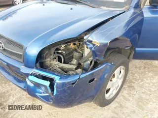 2007 Hyundai Tucson GLS with VIN KM8JM12B77U617990, listed as a IAAI auction lot 41300579 with 167,789 mi miles. Bid and sale history available at carsss.com. Image 6.