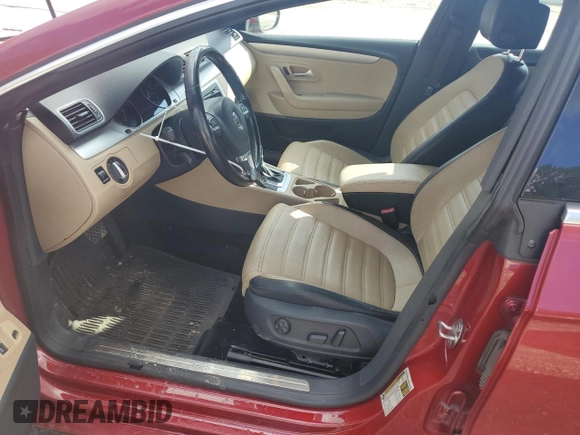 2013 Volkswagen CC Sport with VIN WVWBP7AN5DE547863, listed as a Copart auction lot 79918024 with 105,226 mi miles and Salvage Title. Bid and sale history available at carsss.com. Image 7.