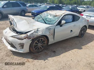 2017 Toyota 86 z VIN JF1ZNAA11H8703549, wystawiony jako IAAI lot #42007728 z przebiegiem 85 327 mil mil oraz . Historia ofert i sprzedaży dostępna na DreamBid. Obrazek 18.