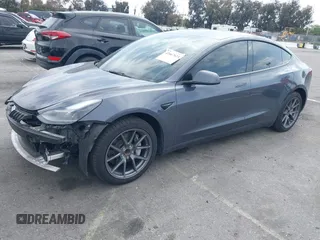 2023 Tesla Model 3 with VIN 5YJ3E1EA4PF410060, listed as a IAAI auction lot 42067624 with 59,934 mi miles and . Bid and sale history available at DreamBid. Image 20.