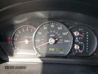 2011 Mitsubishi Endeavor SE z VIN 4A4JN3AS3BE009099, wystawiony jako Copart lot #54279974 z przebiegiem 164 498 mil mil oraz Szkoda całkowita • Salvage title. Historia ofert i sprzedaży dostępna na DreamBid. Obrazek 9.