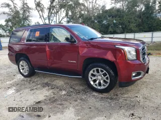 2019 GMC Yukon SLT Standard Edition with VIN 1GKS2DKC2KR363548, listed as a Copart auction lot 85361044 with 50,305 mi miles and Salvage Title. Bid and sale history available at carsss.com. Image 4.