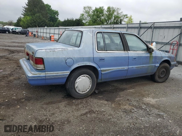 1991 Plymouth Acclaim z VIN 1P3XA4633MF523214, wystawiony jako Copart lot #55908665 z przebiegiem 90 332 mil mil oraz Tytuł czysty. Historia ofert i sprzedaży dostępna na DreamBid. Obrazek 3.