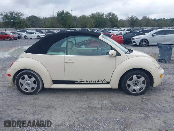 2004 Volkswagen Beetle with VIN 3VWCM21Y64M306721, listed as a IAAI auction lot 41611494 with 183,434 mi miles and . Bid and sale history available at DreamBid. Image 13.