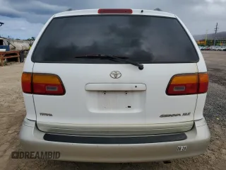 1999 Toyota Sienna LE with VIN 4T3ZF13C4XU134680, listed as a Copart auction lot 74044544 with 127,954 mi miles and Clean Title. Bid and sale history available at carsss.com. Image 6.