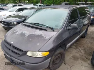 1996 Dodge Caravan Sport with VIN 2B4GP4439TR803645, listed as a IAAI auction lot 42122379 with 185,159 mi miles and . Bid and sale history available at carsss.com. Image 2.