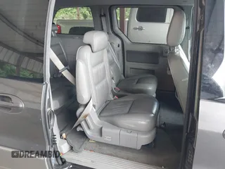 2005 Ford Freestar Limited z VIN 2FMDA58245BA80941, wystawiony jako IAAI lot #42154521 z przebiegiem 133 366 mil mil oraz . Historia ofert i sprzedaży dostępna na DreamBid. Obrazek 8.