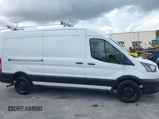 2021 Ford Transit Cargo z VIN 1FTBR1C81MKA40300, wystawiony jako IAAI lot #42707917 z przebiegiem 47 865 mil mil oraz . Historia ofert i sprzedaży dostępna na DreamBid. Obrazek 13.