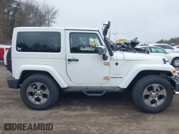 2011 Jeep Wrangler Sahara with VIN 1J4AA5D15BL538240, listed as a IAAI auction lot 41793836 with 172,528 mi miles and . Bid and sale history available at carsss.com. Image 13.