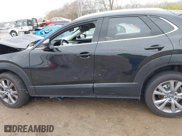 2023 Mazda CX-30 2.5 S Premium Package with VIN 3MVDMBDM3PM559627, listed as a IAAI auction lot 40910485 with 8,365 mi miles. Bid and sale history available at carsss.com. Image 15.