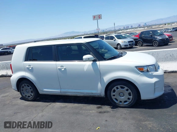 2014 Scion xB with VIN JTLZE4FE8EJ060455, listed as a IAAI auction lot 42114398 with 1 mi miles. Bid and sale history available at carsss.com. Image 12.