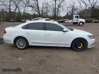 2016 Volkswagen Passat 1.8T SE w/Technology with VIN 1VWBS7A30GC013454, listed as a IAAI auction lot 41477109 with 134,027 mi miles. Bid and sale history available at carsss.com. Image 14.