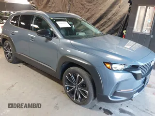 2023 Mazda CX-50 S Premium Plus with VIN 7MMVABEM3PN108555, listed as a IAAI auction lot 41202257 with 21,258 mi miles and . Bid and sale history available at DreamBid. Image 1.