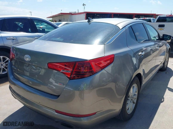 2013 Kia Optima LX with VIN 5XXGM4A75DG225038, listed as a IAAI auction lot 42108738 with 219,264 mi miles. Bid and sale history available at carsss.com. Image 4.