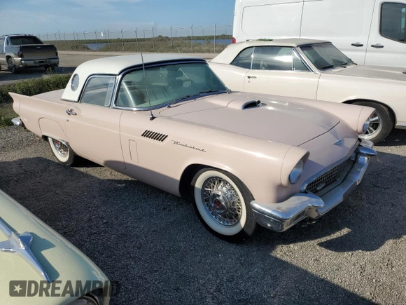 1957 Ford Thunderbird with VIN D7FH309658, listed as a Copart auction lot 75299494 with 50,865 mi miles and Salvage Title. Bid and sale history available at DreamBid. Image 4.