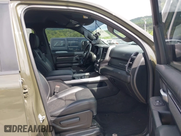 2021 Ram 1500 Big Horn with VIN 1C6SRFFT1MN669218, listed as a IAAI auction lot 42366224 with 50,230 mi miles and . Bid and sale history available at DreamBid. Image 5.