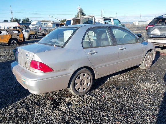 2003 Mitsubishi Lancer ES with VIN JA3AJ26E63U092730, listed as a IAAI auction lot 41506294 with 188,007 mi miles. Bid and sale history available at carsss.com. Image 4.