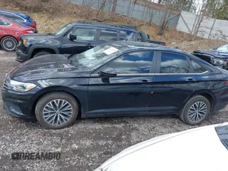 2021 Volkswagen Jetta S z VIN 3VWC57BU0MM035340, wystawiony jako IAAI lot #42045819 z przebiegiem 76 751 mil mil oraz . Historia ofert i sprzedaży dostępna na DreamBid. Obrazek 14.