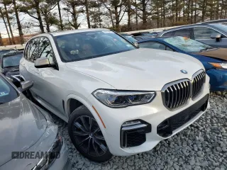 2020 BMW X5 M50i with VIN 5UXJU4C02LLE45422, listed as a Copart auction lot 44119775 with 60,241 mi miles and Salvage Title. Bid and sale history available at DreamBid. Image 4.